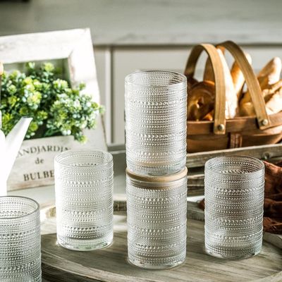 Embossed Bead Point Glass Cups - 14 oz - Includes lid and straw.