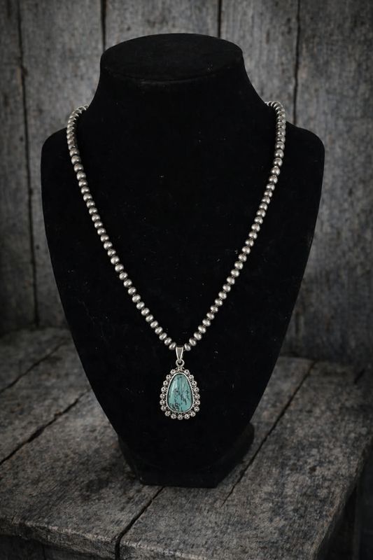 Turquoise pendant on beaded necklace