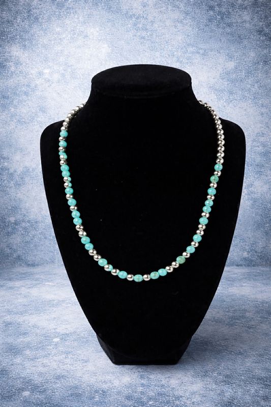 Silver and turquoise colored beaded necklace