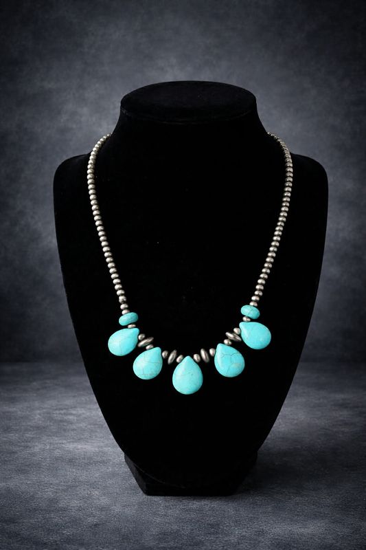 Beaded necklace with pendants/bead accents