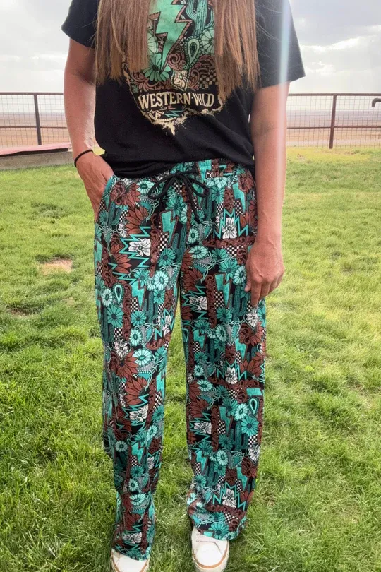 Tattoos In Turquoise Pants