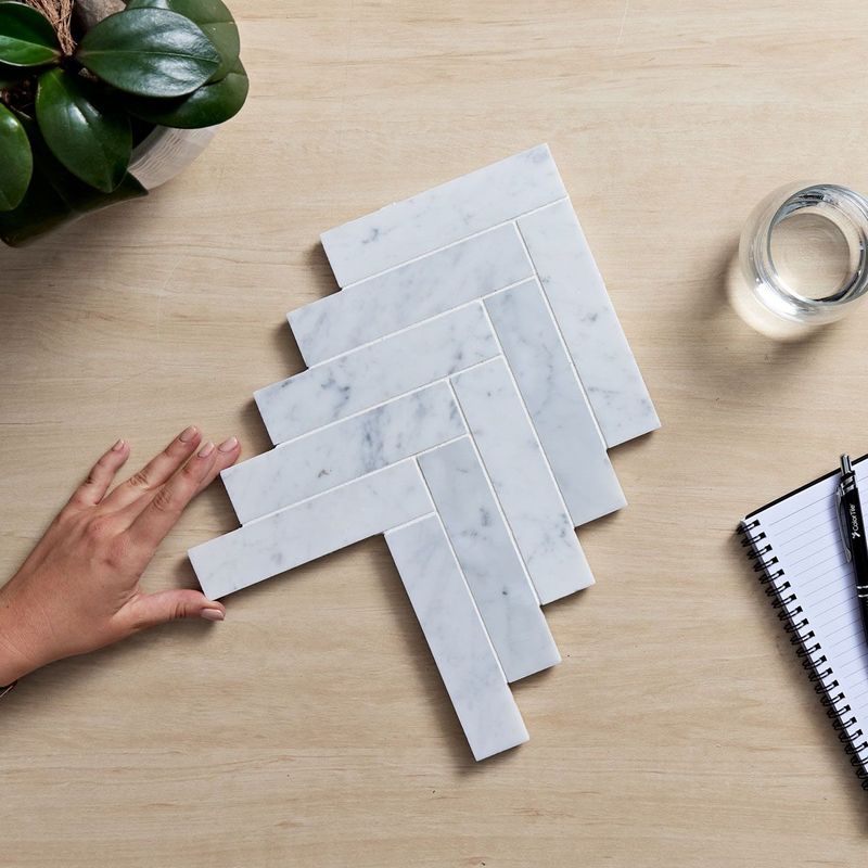 AURA CARRARA HONED HERRINGBONE 35X150MM (PCE) CAHB35150-H 0.0565m2/Sheet
