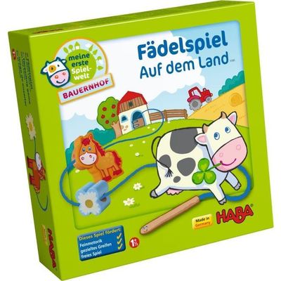 Auf diesem Bild sieht man die Vorderseite der Verpackung  vom HABA-Fädelspiel Auf dem Land.