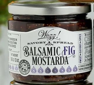 Jar of Wozz Kitchen Fig Balsamic Mostarda condiment with figs and balsamic glaze