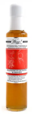 250 ml bottle of Wozz! Grapefruit Juniper & Honey Finishing Vinegar – citrusy small-batch vinegar made with honey and juniper