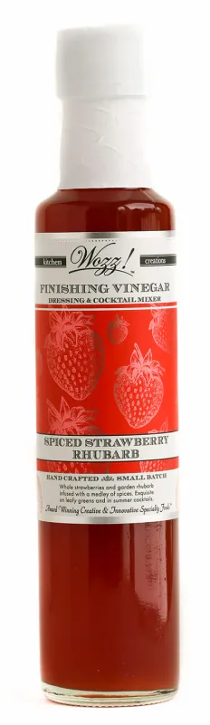 250 ml bottle of Wozz! Spiced Strawberry Rhubarb Finishing Vinegar – made with whole strawberries, rhubarb, and warming spice