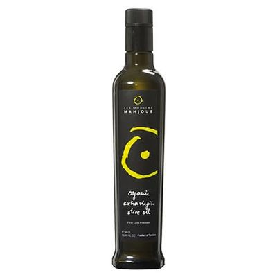Organic Tunisian extra virgin olive oil in a green bottle – North African cold-pressed olive oil.