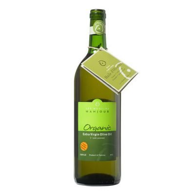 Organic Tunisian extra virgin olive oil in a green bottle – North African cold-pressed olive oil.