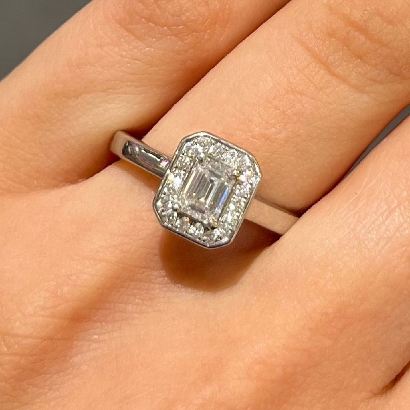 Platinum 0.50ct Emerald Cut Diamond Solitaire Halo Ring