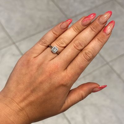 Pre-Owned Platinum Emerald Cut Diamond Halo Ring 0.50ct F Si1