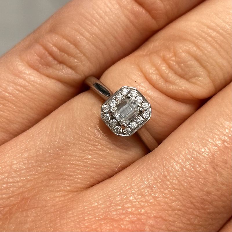 Pre-Owned Platinum Emerald Cut Diamond Halo Ring 0.50ct F Si1