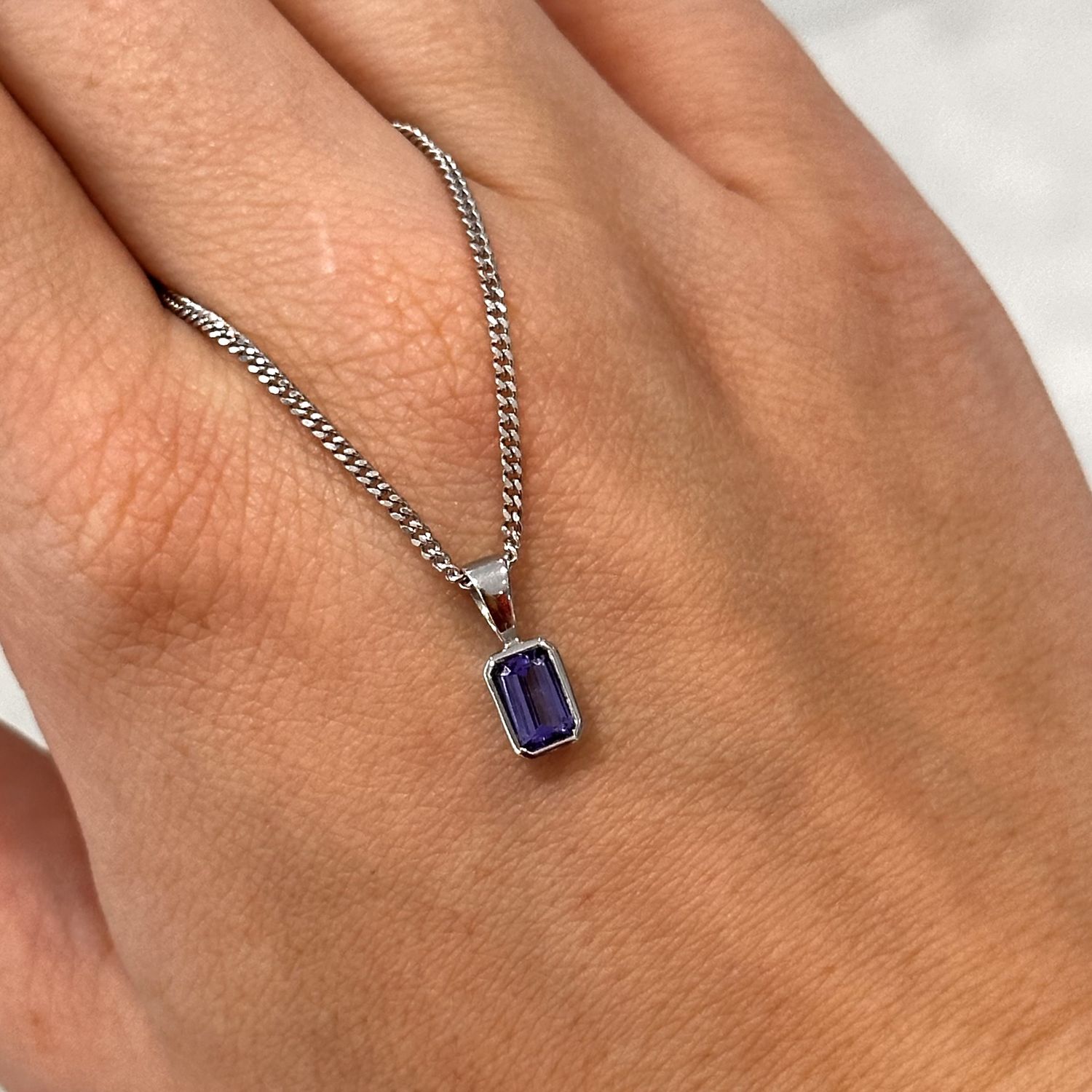 9ct White Gold  Octagon Tanzanite Rubover Pendant