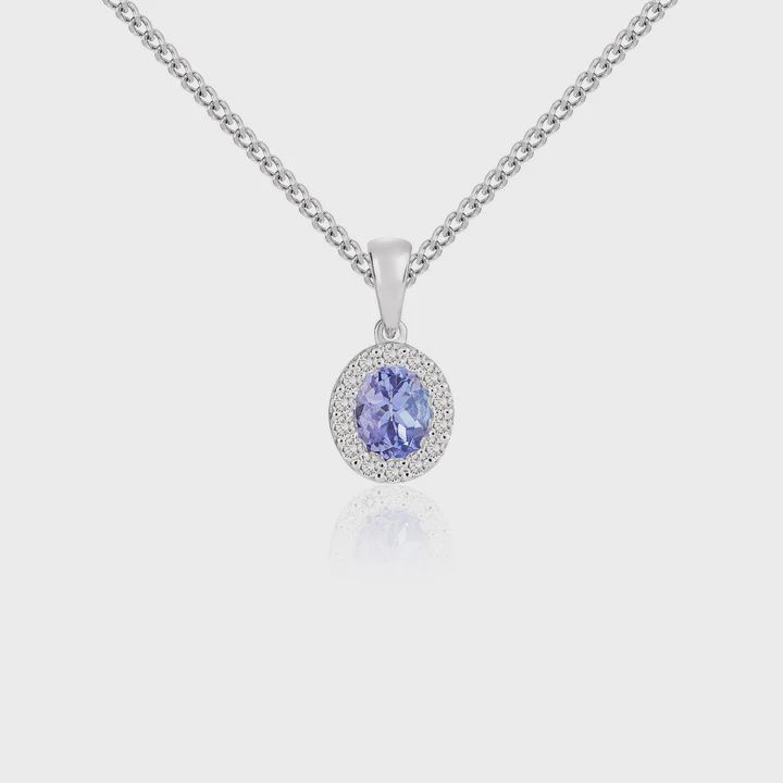 18ct White Gold Oval Tanzanite &amp; Diamond Cluster Pendant