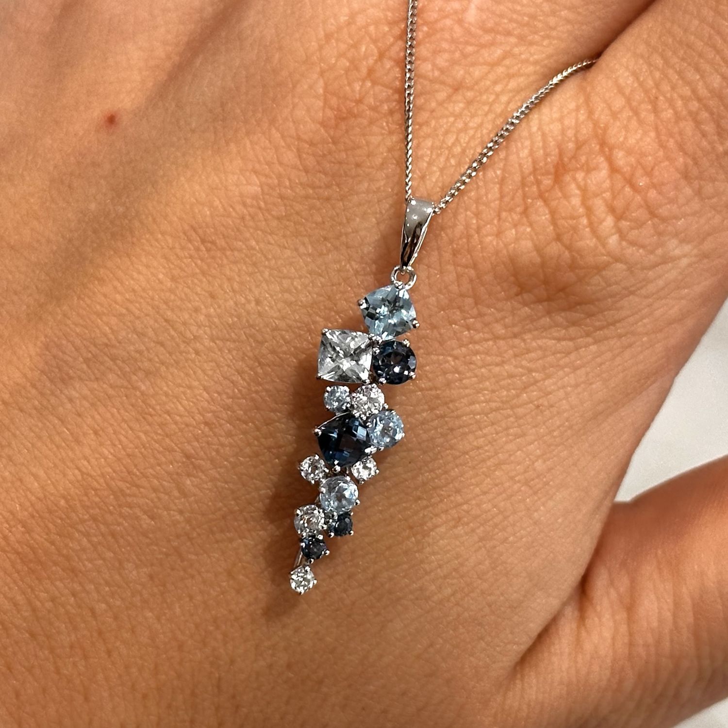 9ct White Gold Multi Sone Blue Topaz Pendant