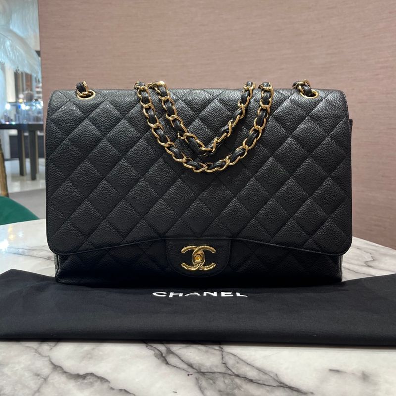 Pre-Owned Chanel Classic Double Flap Maxi in Black Caviar