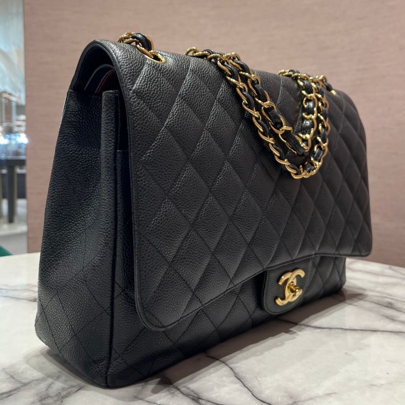 Pre-Owned Chanel Classic Double Flap Maxi in Black Caviar