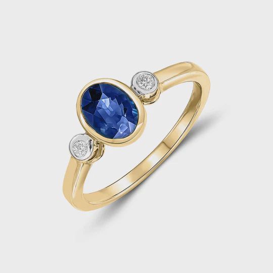 9ct 0.92ct Oval Sapphire &amp; 0.05ct Diamond Rubover Three Stone Ring