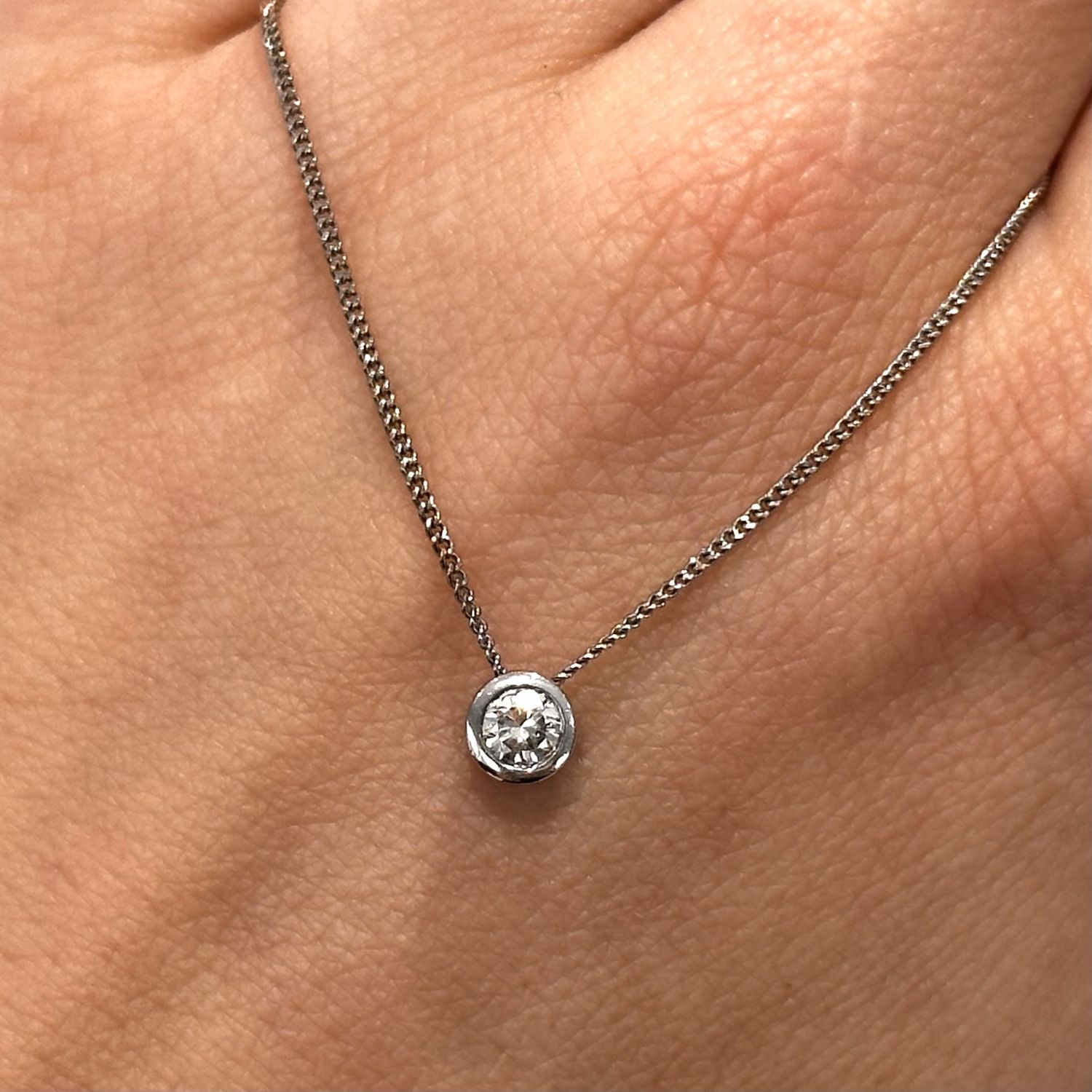 Pre-Owned 18ct White Gold 0.23ct Diamond Solitaire Pendant with 18ct Curb Chain 18”