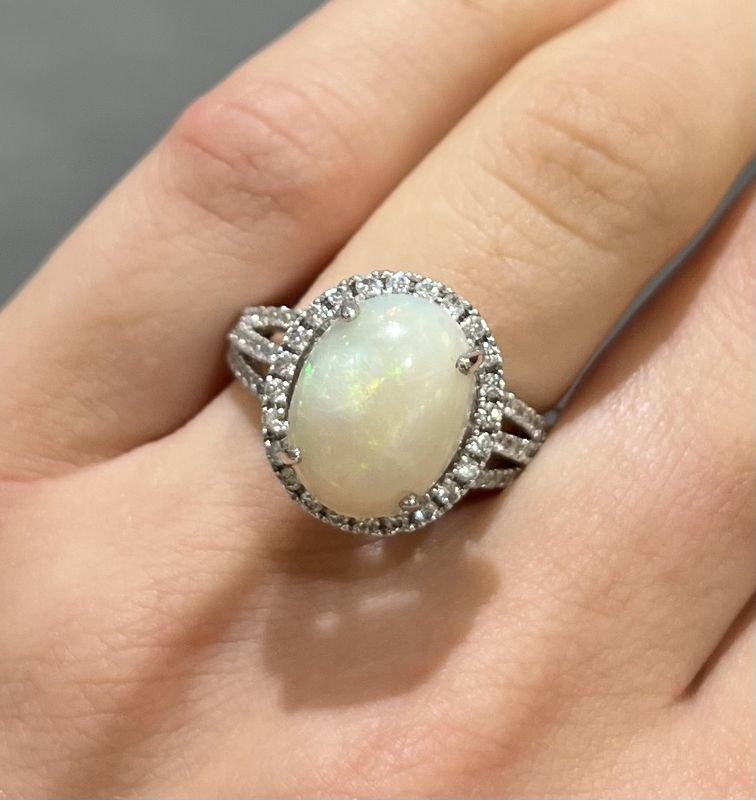 18ct White Gold Oval Opal &amp; Diamond Halo Ring