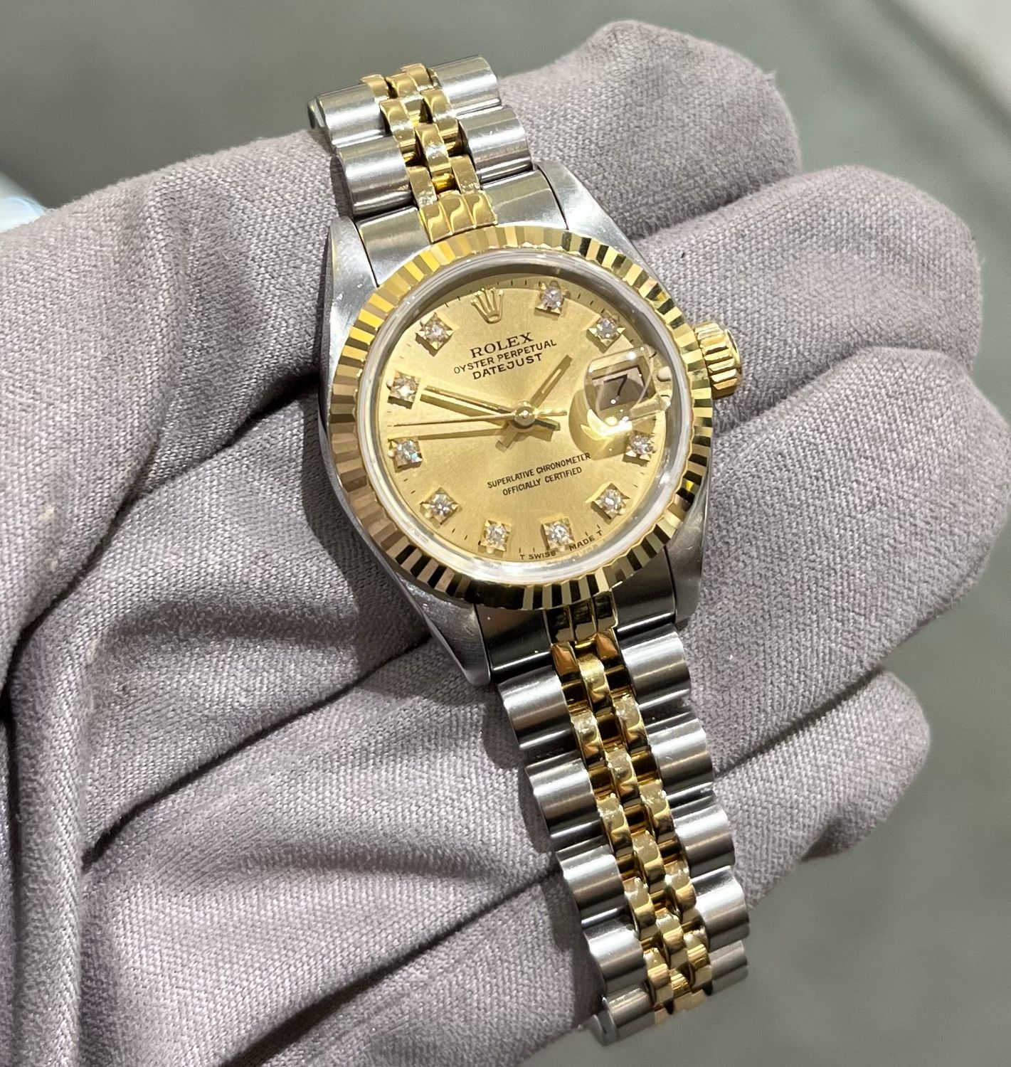 Pre-Owned Rolex Oyster Perpetual Factory Champagne Diamond Dial Datejust 69173