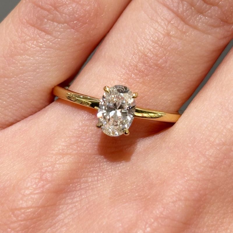 18ct Yellow Gold 0.80ct G SI2 Oval Cut Diamond Solitaire With Hidden Halo