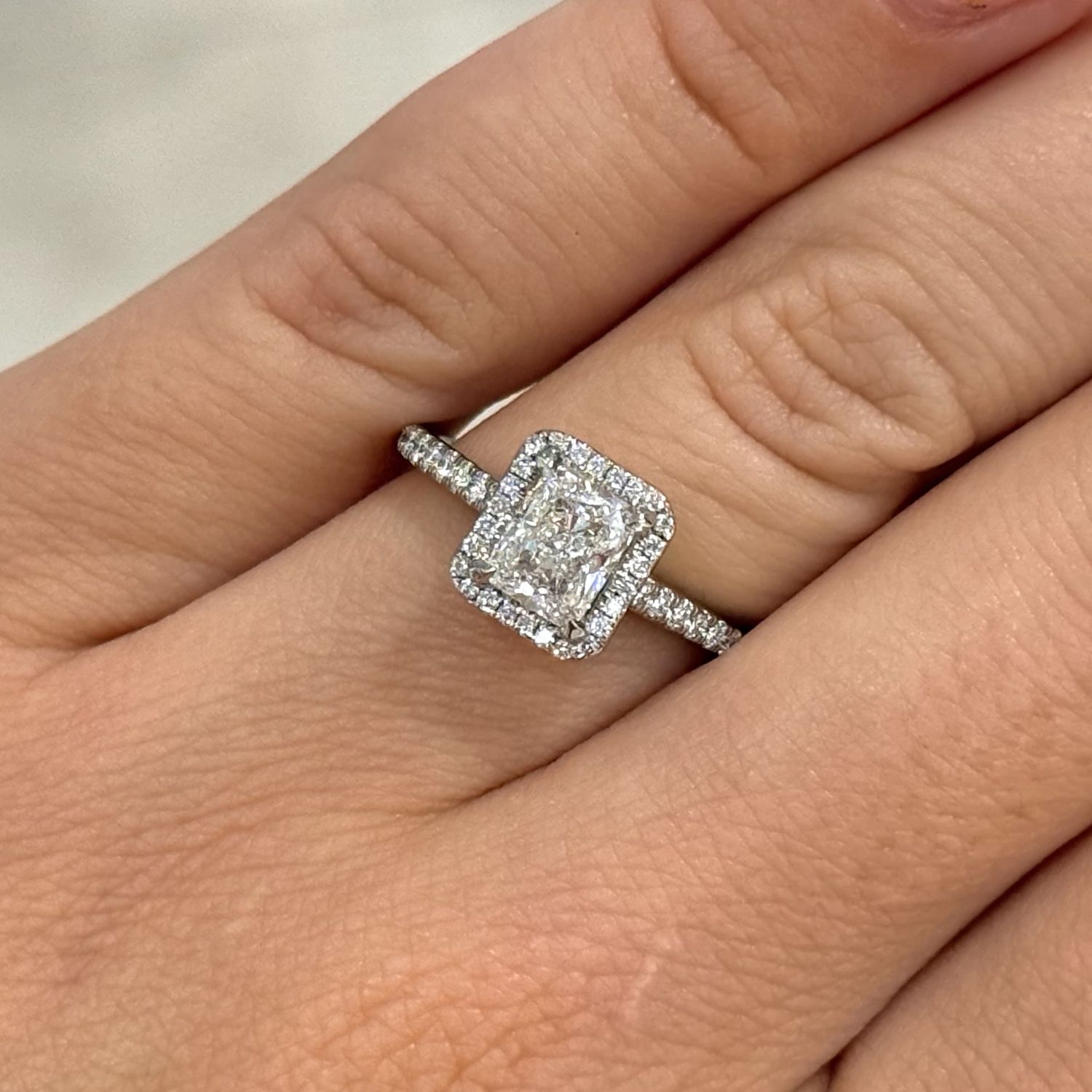 Pre-Owned Platinum 1.01ct Radiant Cut Diamond with Diamond Halo