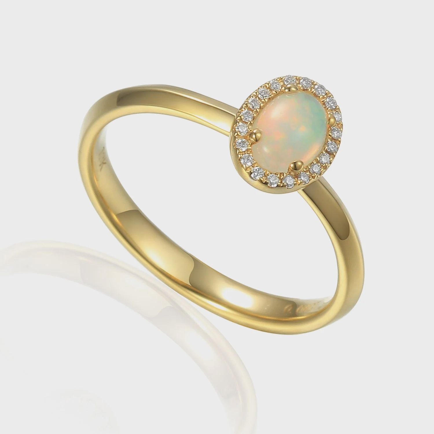 9ct Yellow Gold 0.34ct Oval Opal &amp; 0.05ct Diamond Halo Ring