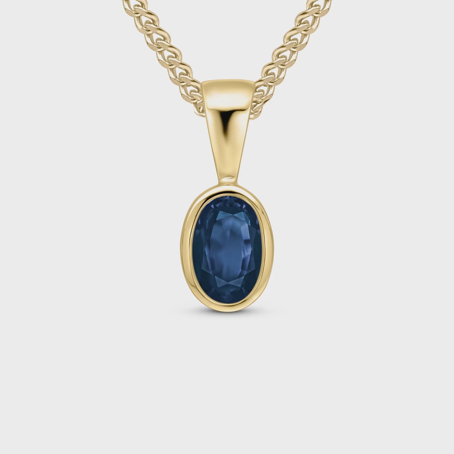 9ct Yellow Gold Oval 0.61ct Sapphire Rubover Pendant