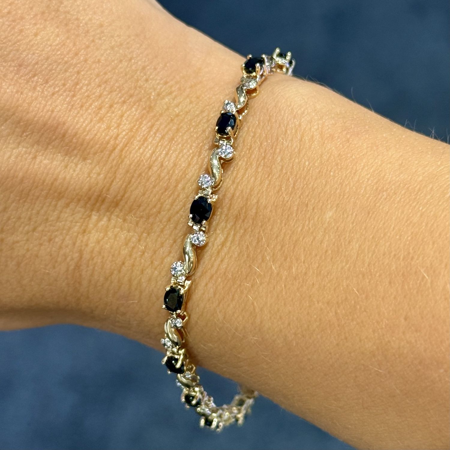 Pre-Owned 9ct Yellow Gold 1.98ct Oval Cut Sapphire Tennis Bracelet
