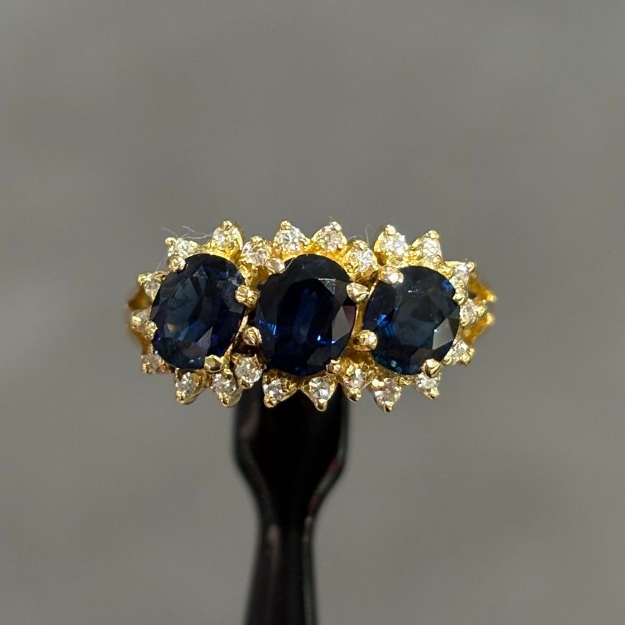 Pre-Owned 18ct Yellow Gold 1.50ct Sapphire &amp; 0.12ct Diamond Cluster Ring