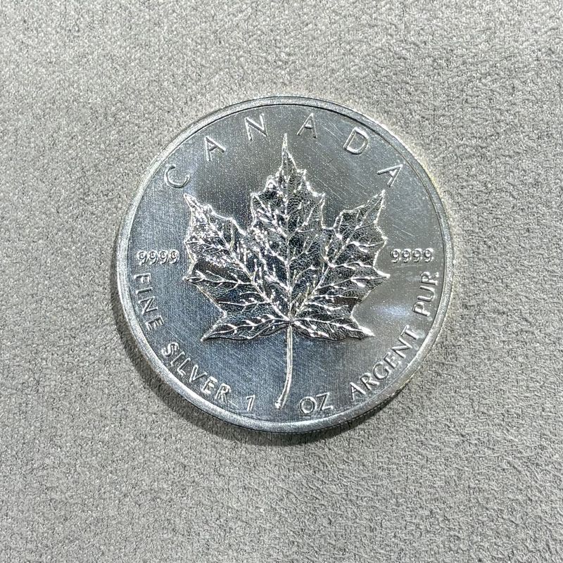 Pre-Owned 1oz Silver Maple Coin