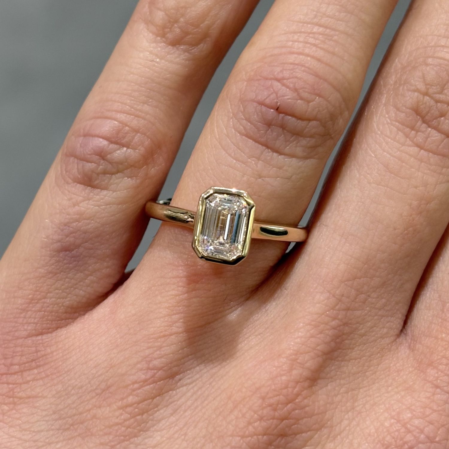 9ct Yellow Gold 1.16ct Emerald Cut Lab Grown Rubover Set Ring