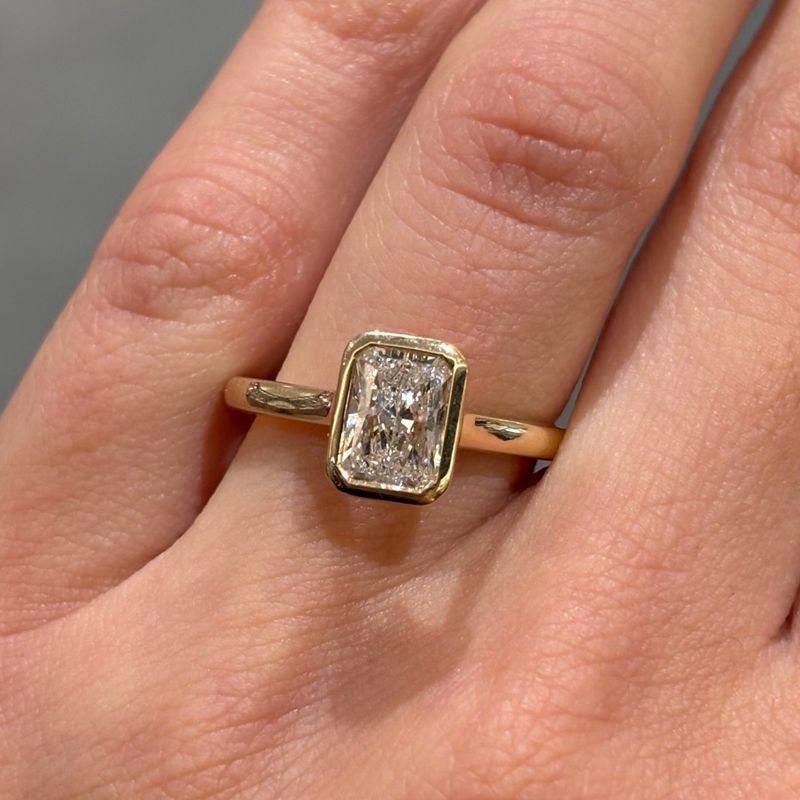9ct Yellow Gold 1.09ct Radiant Cut Lab Grown Diamond Rubover Set Ring