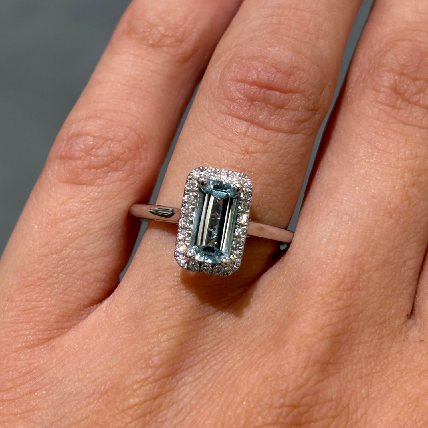 18ct White Gold 0.90ct Emerald Cut Aquamarine & Diamond Halo Ring 18ct White Gold 0.90ct Emerald Cut Aquamarine & Diamond Halo Ring