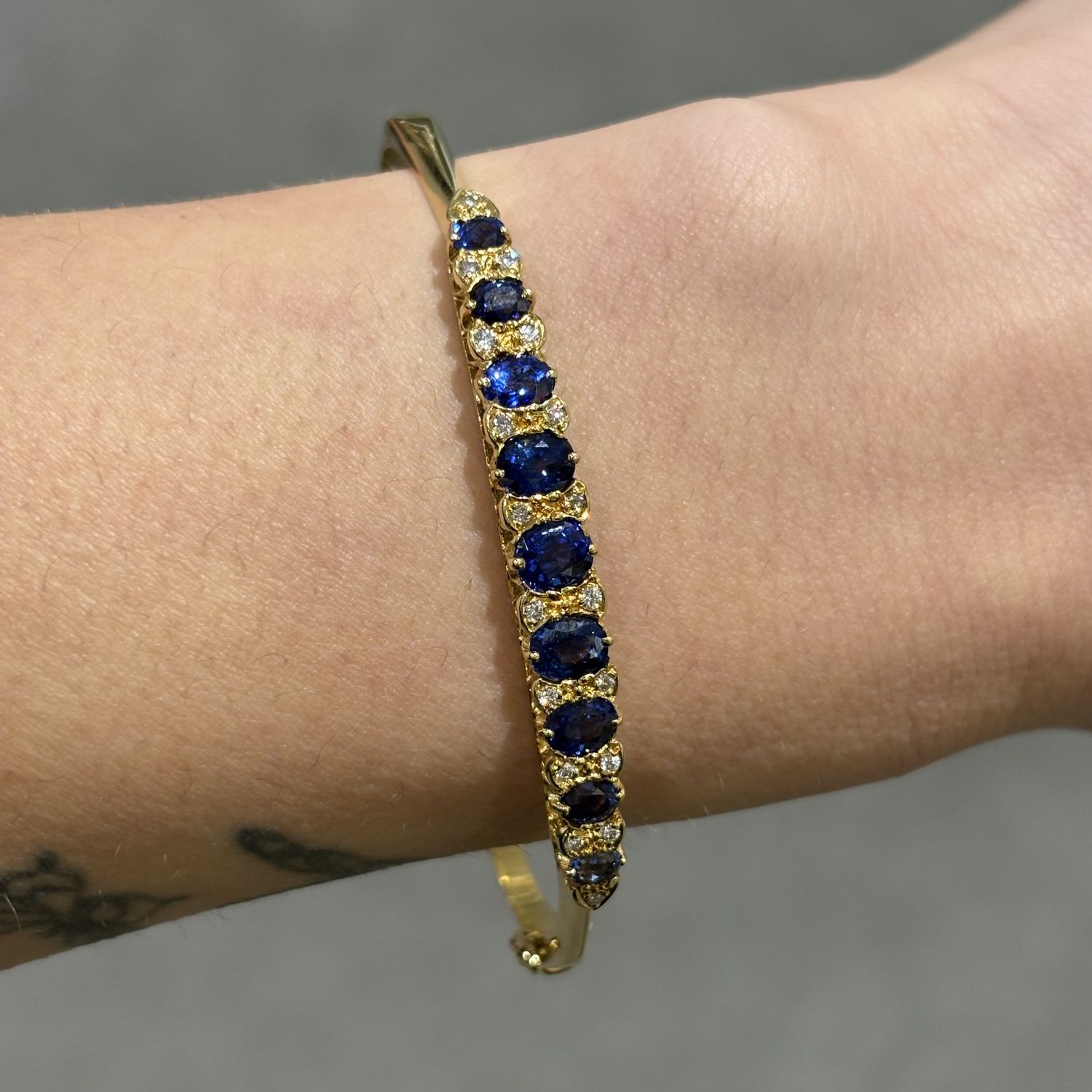 Pre-Owned 18ct Yellow Gold 3.00ct Sapphire &amp; 0.10ct Diamond Set Bangle