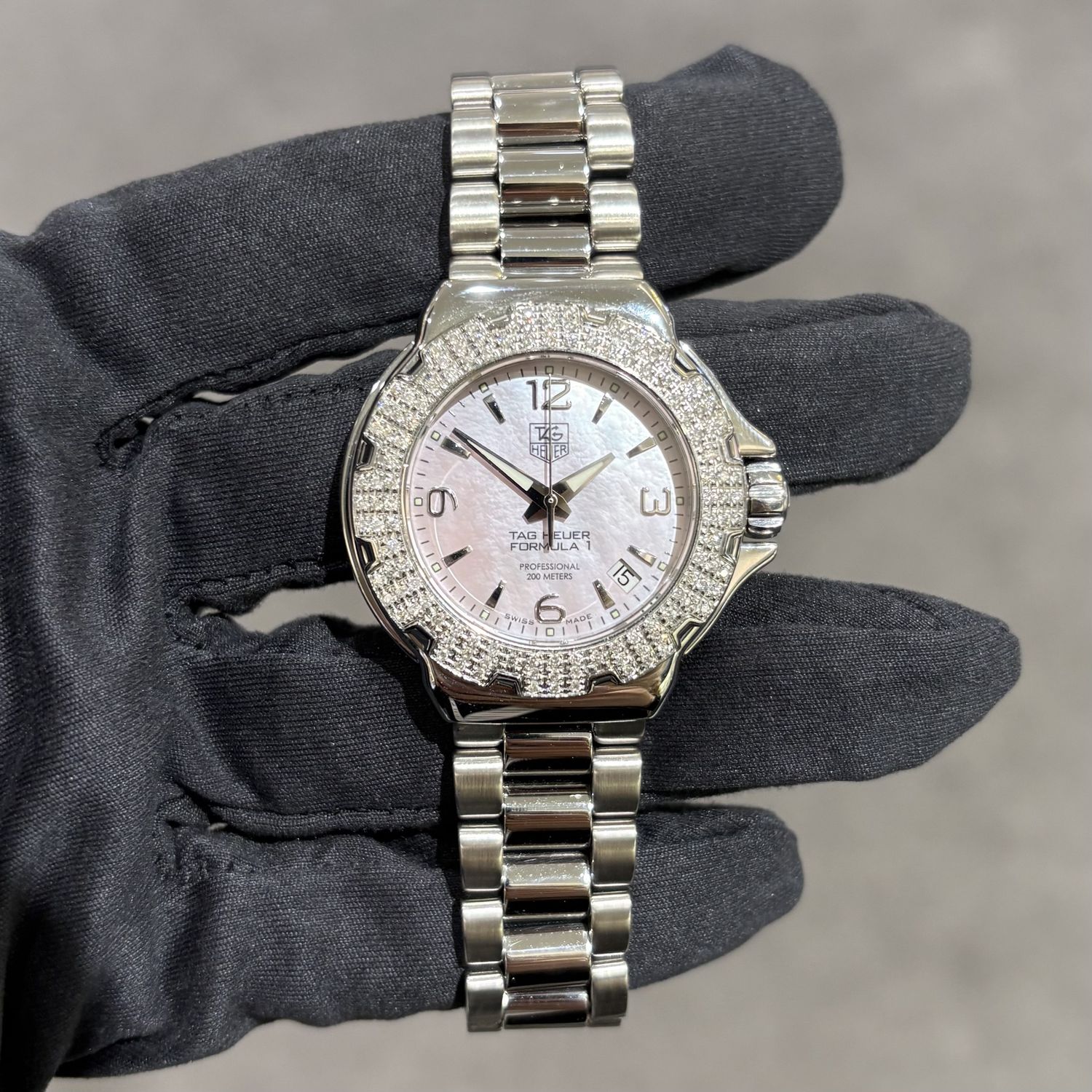 Pre-Owned Tag Heuer Formula 1 Pink Mother Of Pearl Steel Quartz Ladies Watch WAC1216 Pre-Owned Tag Heuer Formula 1 Pink Mother Of Pearl Steel Quartz Ladies Watch WAC1216