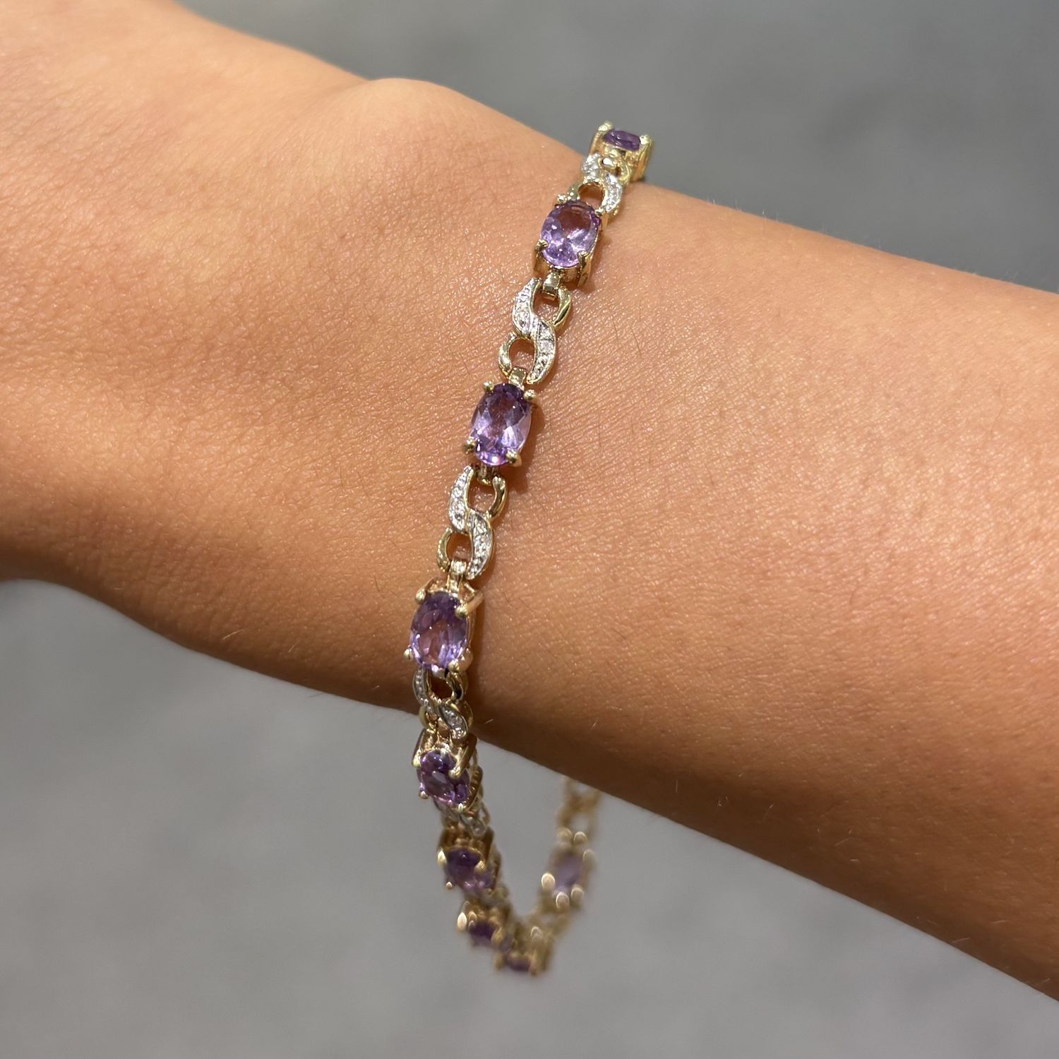 Pre-Owned 9ct Yellow Gold 4.20ct Oval Amethyst &amp; 0.15ct Diamond Tennis Bracelet