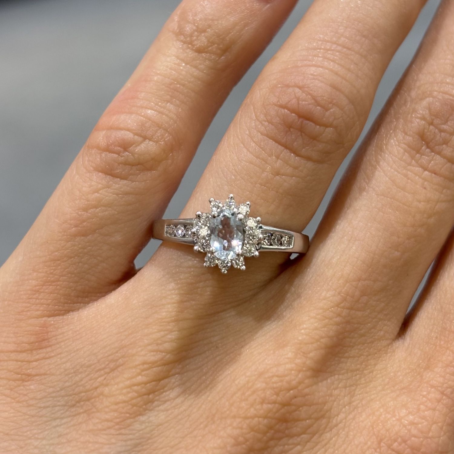 Pre-Owned 18ct White Gold 0.37ct Oval Aquamarine & 0.30ct Diamond Cluster Ring Pre-Owned 18ct White Gold 0.37ct Oval Aquamarine & 0.30ct Diamond Cluster Ring