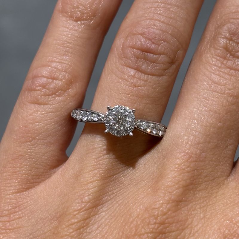 Pre-Owned 9ct White Gold 0.50ct Diamond Halo Ring Pre-Owned 9ct White Gold 0.50ct Diamond Halo Ring