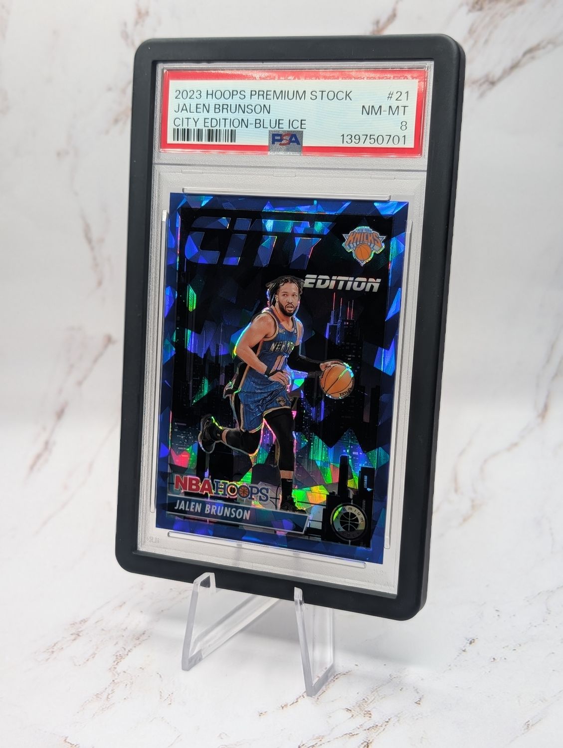 2023 Panini Hoops Premium Stock City Edition Jalen Brunson 21 City Edition-Blue Ice PSA NM-MT 8 2023 Panini Hoops Premium Stock City Edition Jalen Brunson 21 City Edition-Blue Ice PSA NM-MT 8