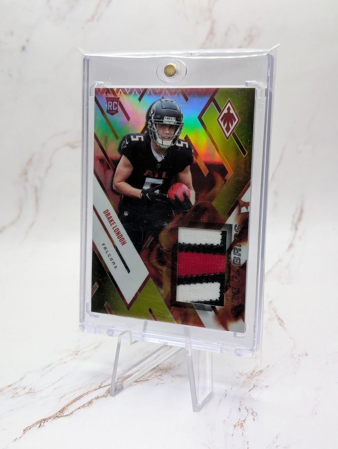 2022 Panini Phoenix - Fire Fabrics Drake London #FIRE-17 Yellow Prime /35 (MEM, RC)