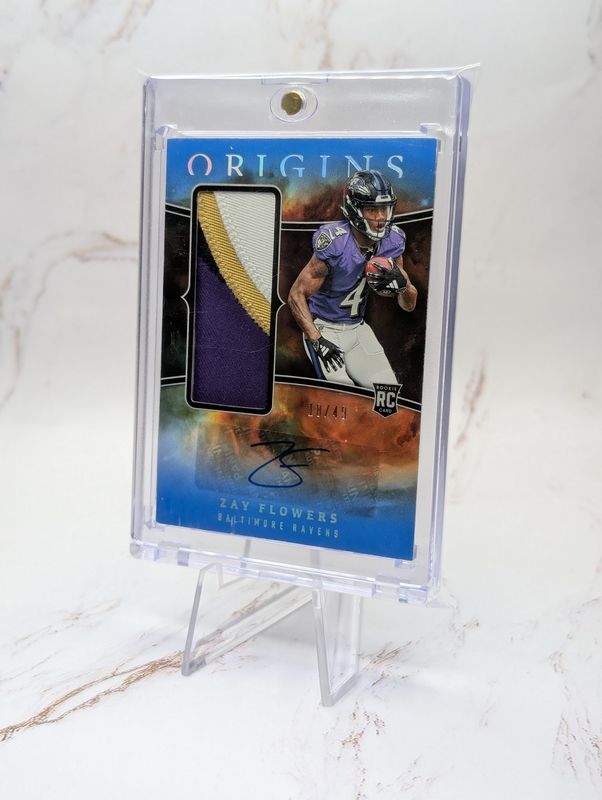 Rookie Jumbo Jersey  2023 Panini Origins -  Autographs Zay Flowers #RJJA-ZF Blue /49  (AU, MEM, RC)