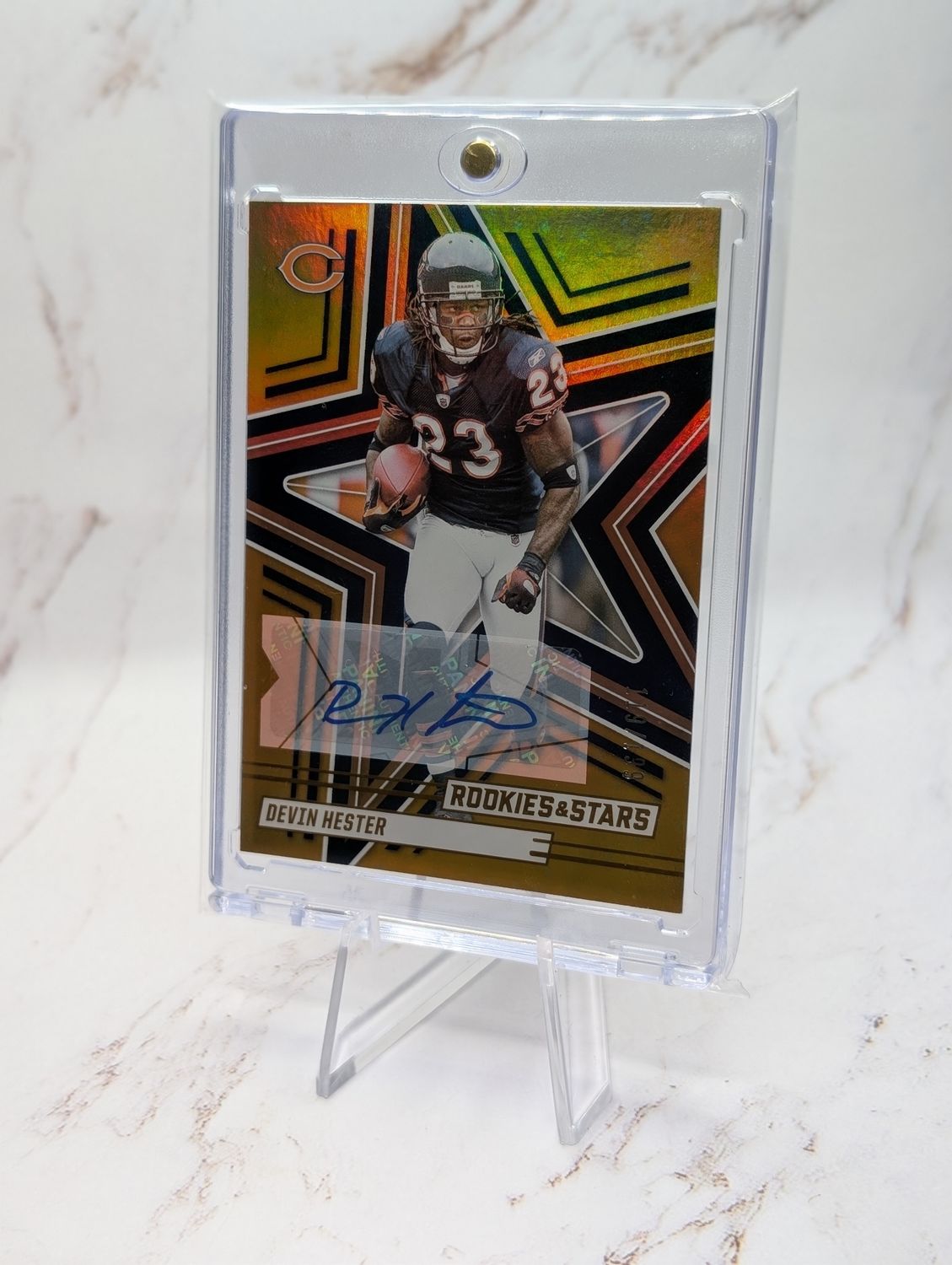 2025 Panini Rookies & Stars - Devin Hester #66 Orange Signatures /199 (AU)