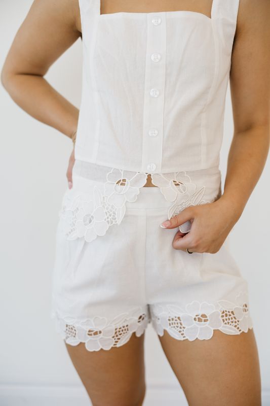 Button Down Peplum Top W/ Embroidered Hem
