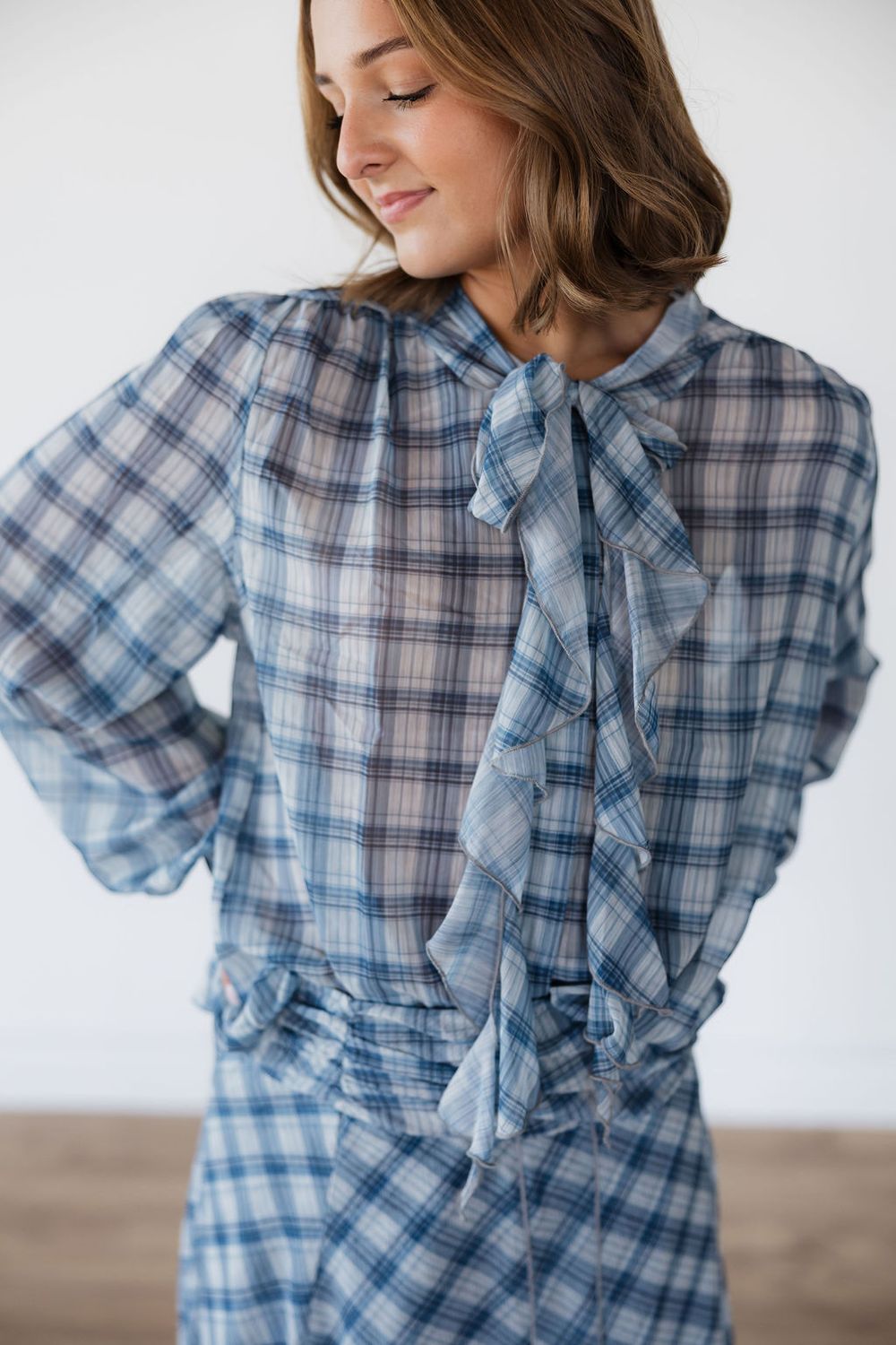 Tie-Neck Ruffle Front Plaid Blouse