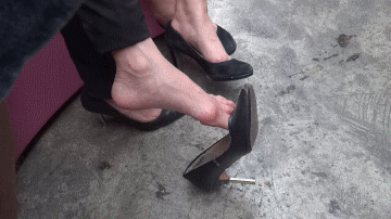 Tip Toe High Heel Shoe Dangling Bank Employee