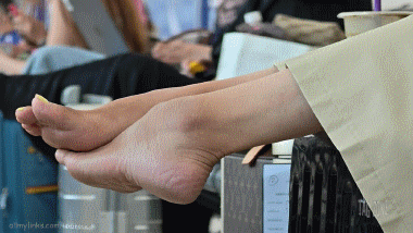 Japanese MILF Feet on Suitcase