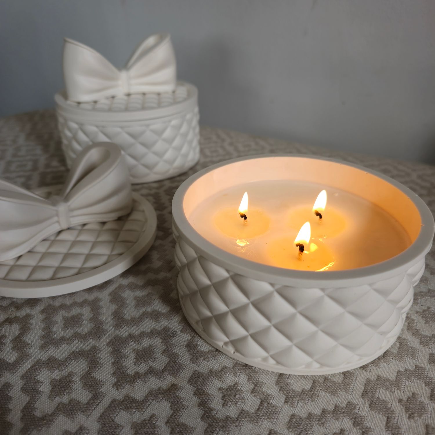 Handmade in Wexford, Ireland. A uniquely intriguing piece available in neutral colours. With a large candle expertly made with a blend of coconut, rapeseed and soy wax and high quality, cruelty &amp; phthalate free fragrance oils that will fill your home with the most beautiful scent.