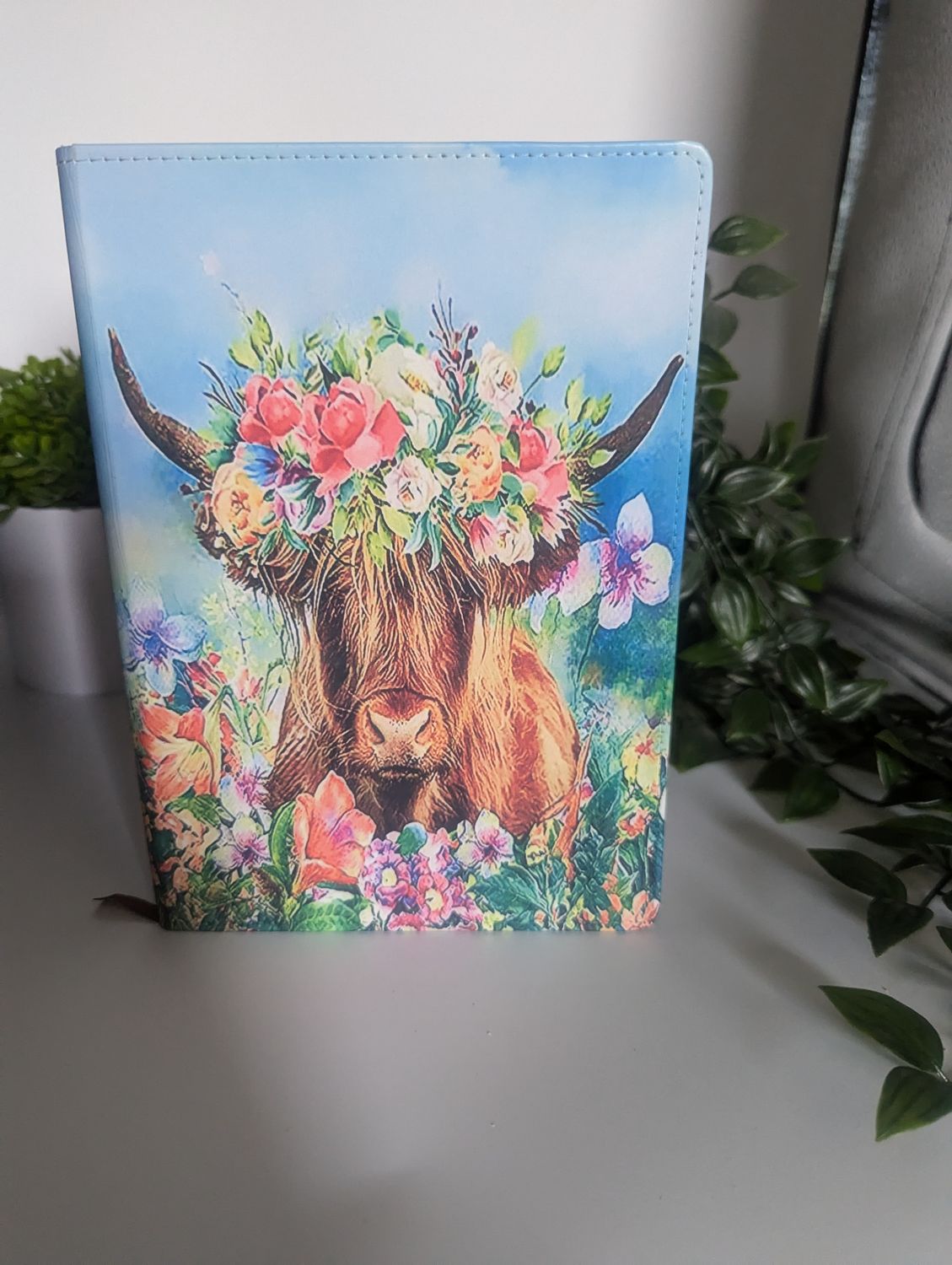 Highland Cow in the Flowers Large Notebook