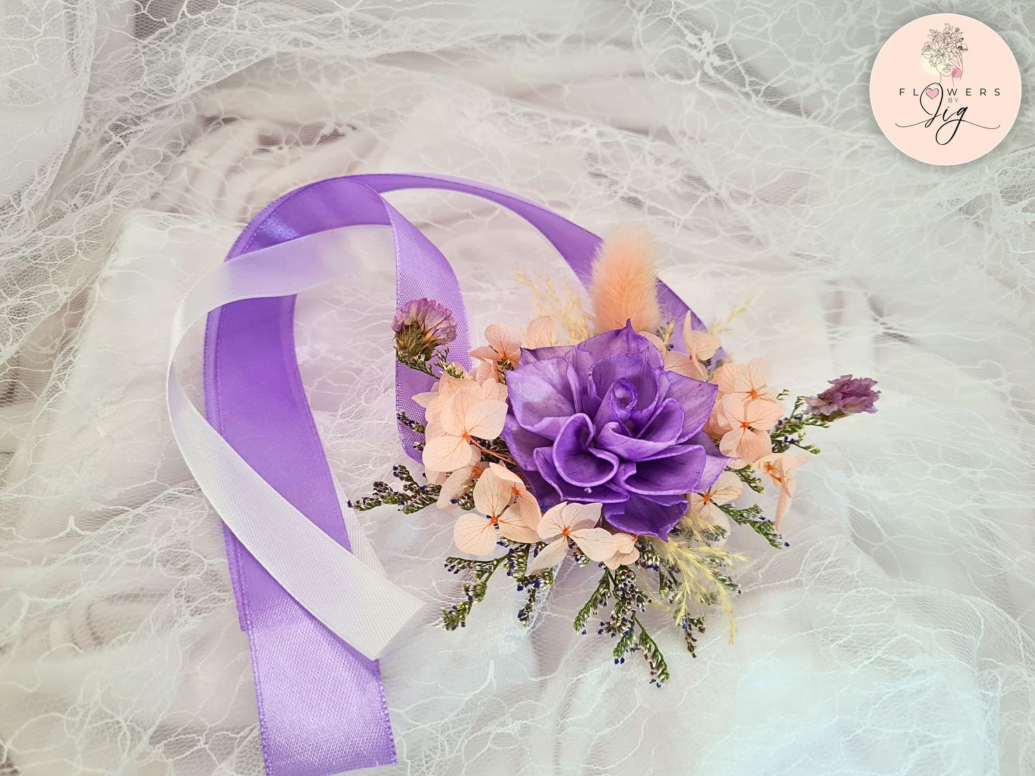 Handcrafted Purple Dahlia Sola Wood Corsage/Boutonniere features a stunning purple dahlia with caspia, hydrangea, statice, and bunny tail accents, finished with purple and white ribbons, perfect for weddings, proms, and special occasions